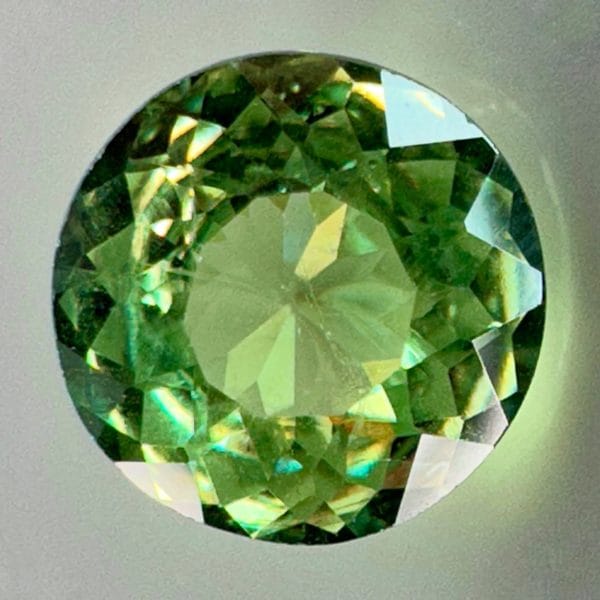 0.38 carat natural demantoid garnet from Namibia, bright green color and beautiful clarity.