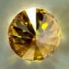 0.30 carat natural orange-yellow diamond with SI2 clarity and vibrant luster, perfect for jewelry or collection.