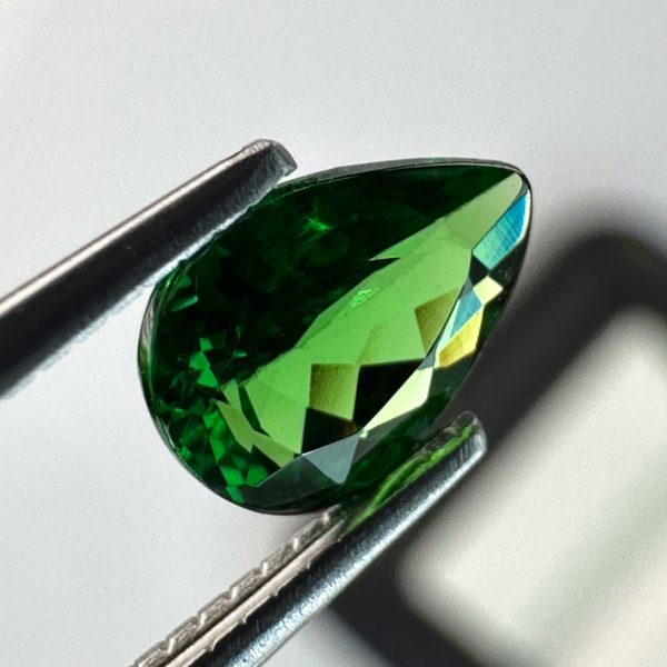 a close up of a green gem