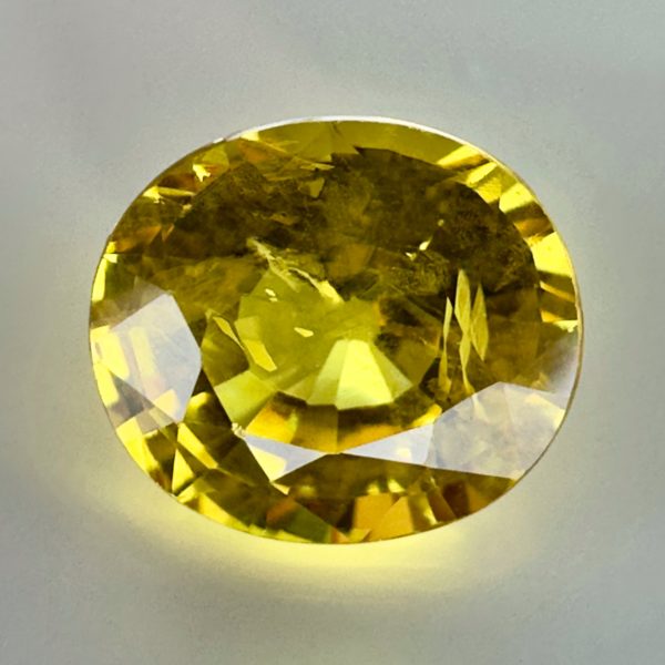 Tanzanian yellow sapphire exhibiting a luminous golden color and beautiful clarity