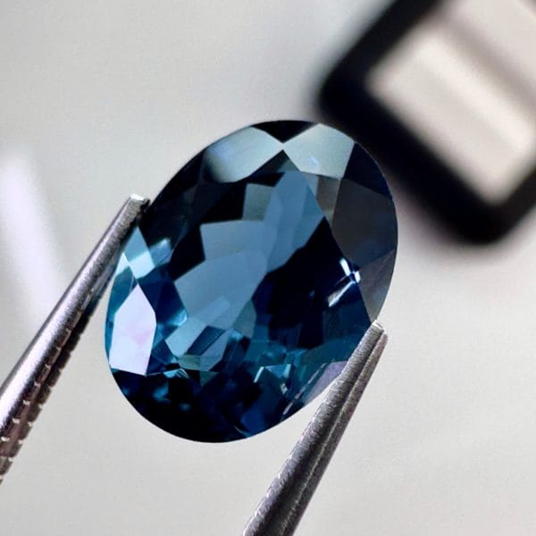 High quality 3.22ct oval shaped London Blue Topaz with a deep blue hue, luminous brilliance and excellent clarity - perfect for fine jewelry designs.