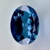 High quality 3.22ct oval shaped London Blue Topaz with a deep blue hue, luminous brilliance and excellent clarity - perfect for fine jewelry designs.