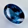 High quality 3.22ct oval shaped London Blue Topaz with a deep blue hue, luminous brilliance and excellent clarity - perfect for fine jewelry designs.