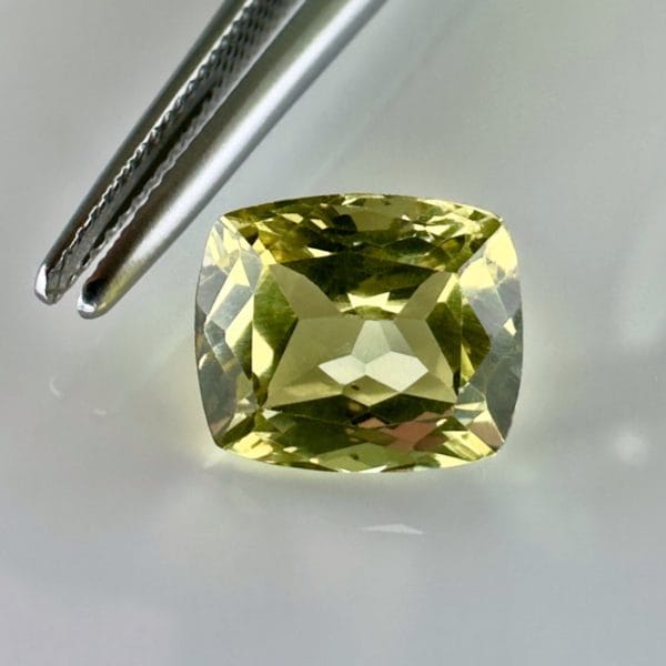 Yellow Apatite Gemstone, 3.40 Carat, Cushion Cut, Perfect Eye Clarity, Vibrant Yellow-Green Hue, Ideal for High Quality Jewelry.