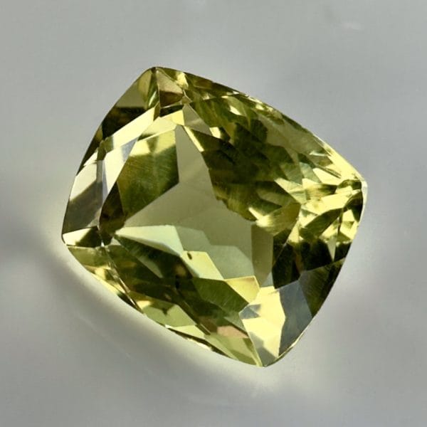 Yellow Apatite Gemstone, 3.40 Carat, Cushion Cut, Perfect Eye Clarity, Vibrant Yellow-Green Hue, Ideal for High Quality Jewelry.