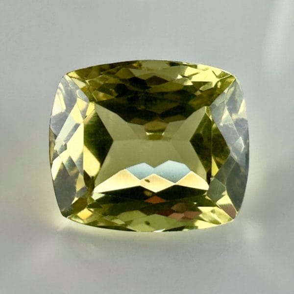 Yellow Apatite Gemstone, 3.40 Carat, Cushion Cut, Perfect Eye Clarity, Vibrant Yellow-Green Hue, Ideal for High Quality Jewelry.