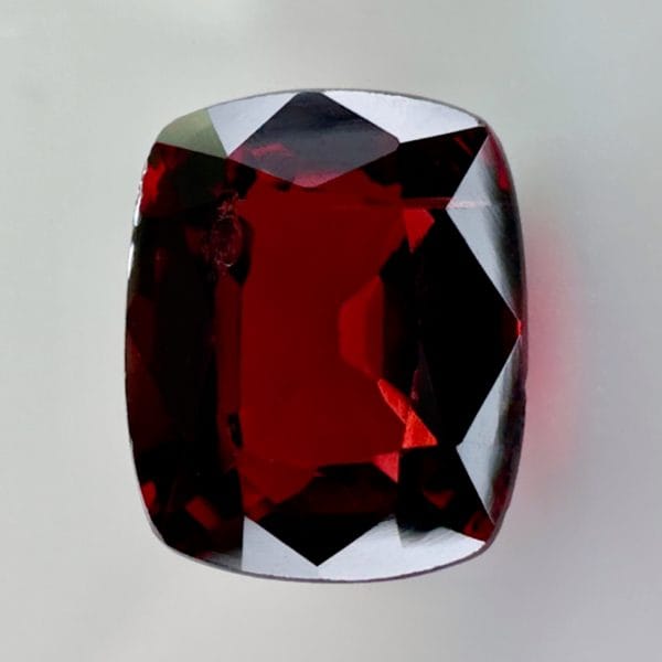 1.58 carat red spinel, cushion shape, Burmese origin, excellent clarity